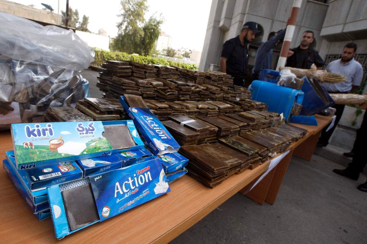 Palestinian security forces from the Islamic group Hamas display seized marijuana and illegal drugs at a police compound in Gaza City, Tuesday, Oct. 5, 2010.