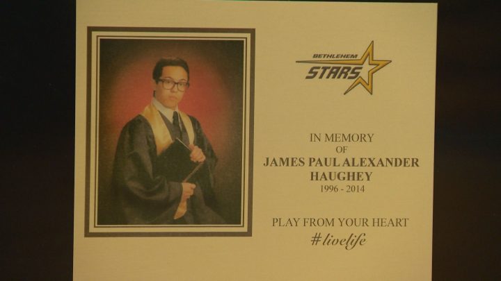 A plaque displayed on the side of the piano.