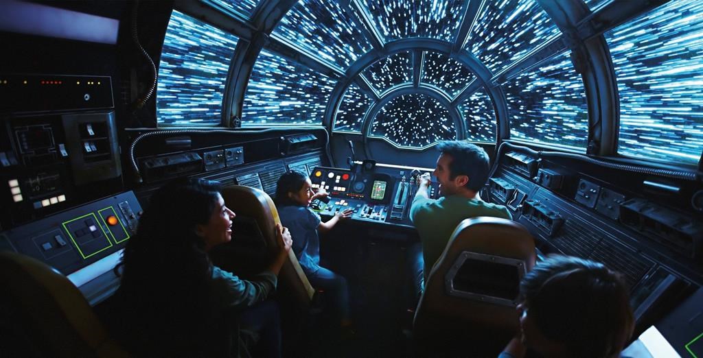 This rendering released by Disney and Lucasfilm shows people on the planned Inside Millennium Falcon: Smugglers Run attraction, part of Star Wars: Galaxy's Edge, a 14-acre area set to open this summer at the Disneyland Resort in Anaheim, Calif.