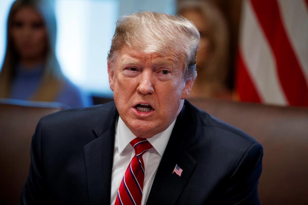 FILE - In this Tuesday, Feb. 12, 2019, file photo, President Donald Trump speaks during a cabinet meeting at the White House in Washington. The Senate resoundingly approved a border security compromise Thursday that ignores most of President Donald Trump's demands for building a wall with Mexico but would prevent a new government shutdown.