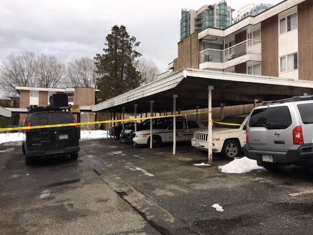 Police tape up at the Bristol Estates in Surrey Monday.