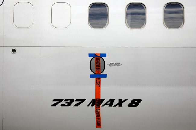 FILE PHOTO: A seal is seen on Garuda Indonesia's Boeing 737 Max 8 airplane parked at the Garuda Maintenance Facility AeroAsia, at Soekarno-Hatta International airport near Jakarta, Indonesia, March 13, 2019. REUTERS/Willy Kurniawan/File Photo.