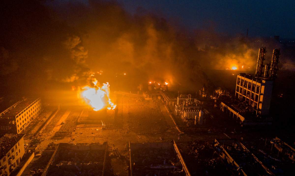 Smoke billows from fire following an explosion at the pesticide plant owned by Tianjiayi Chemical, in Xiangshui county, Yancheng, Jiangsu province, China March 21, 2019. Picture taken March 21, 2019. REUTERS/Stringer