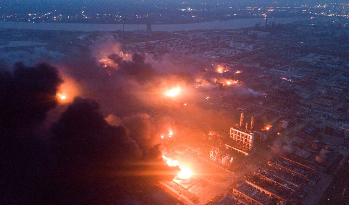 Smoke billows from fire following an explosion at the pesticide plant owned by Tianjiayi Chemical, in Xiangshui county, Yancheng, Jiangsu province, China March 21, 2019. Picture taken March 21, 2019. REUTERS/Stringer 