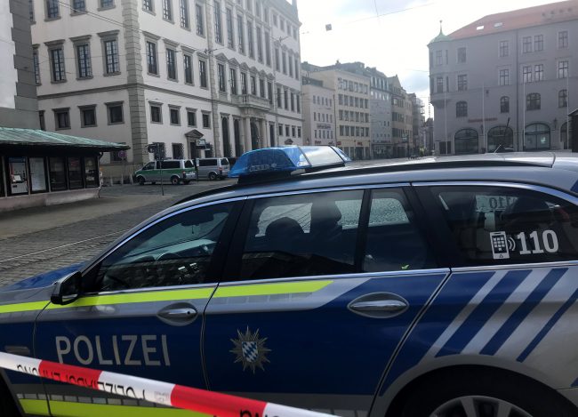 Police secure the area near the Augsburg town hall, Germany, March 26, 2019.
