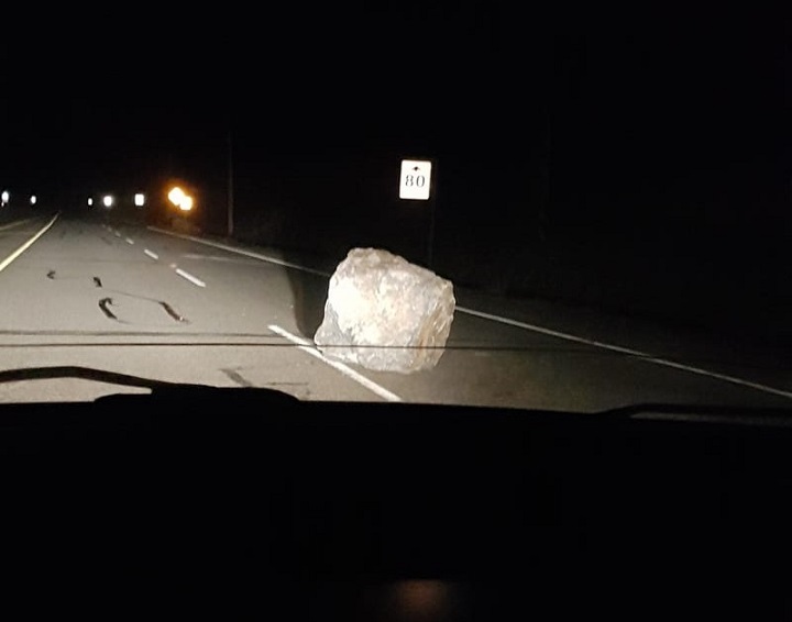 A Princeton, B.C., resident took this photo of a boulder blocking a lane shortly after Friday night’s rockslide along Highway 3 west of Keremeos. 