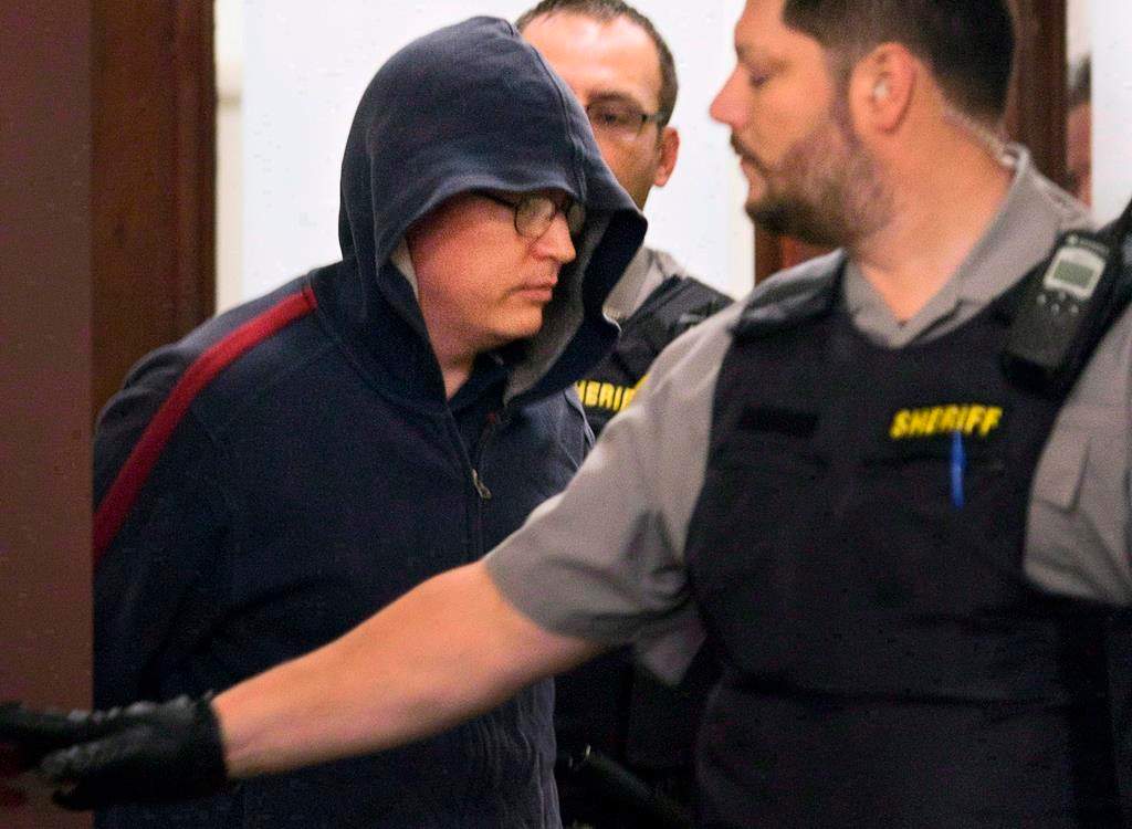Jeffrey Delisle leaves court in Halifax on Oct. 10, 2012. THE CANADIAN PRESS/Andrew Vaughan.