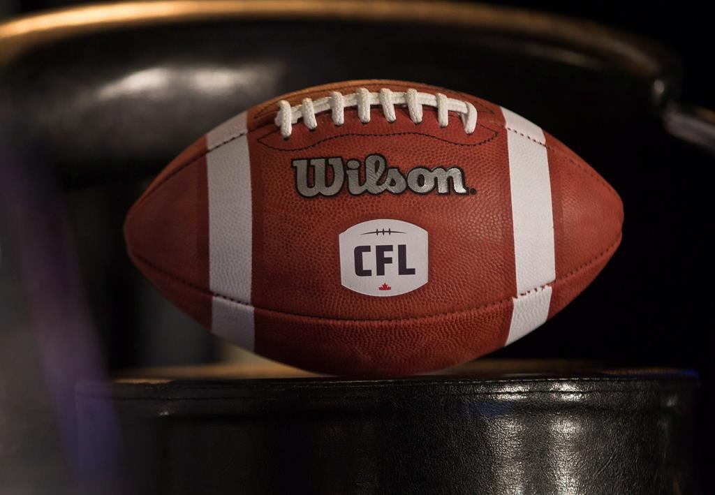 A football with the new CFL logo sits on a chair in Winnipeg, Friday, November 27, 2015.