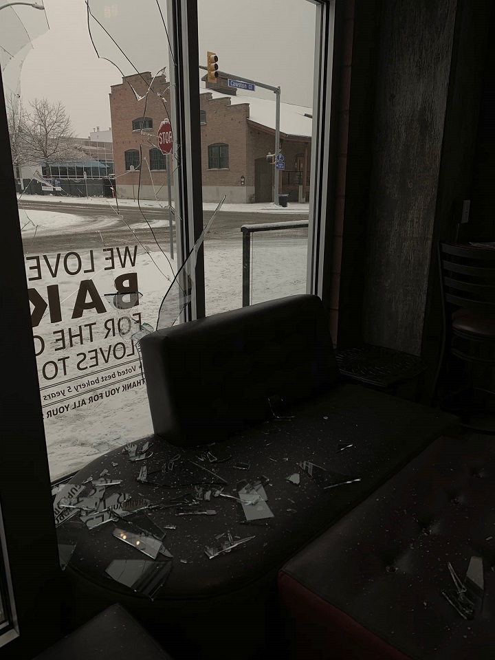 An inside look at the broken window, and shards of glass, at Bliss Bakery in Kelowna.