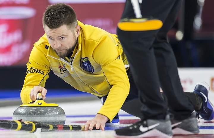 Team Manitoba skip Mike McEwen makes a shot during the 7th draw against team Yukon at the Brier in Brandon, Man. Monday, March 4, 2019.