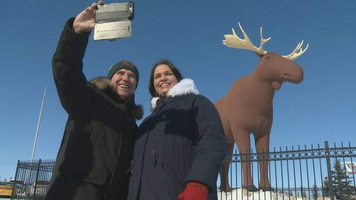 Moose Jaw Mayor Fraser Tolmie and Stor-Elvdal deputy mayor Linda Henriksen pose for a selfie in front of Mac the Moose.