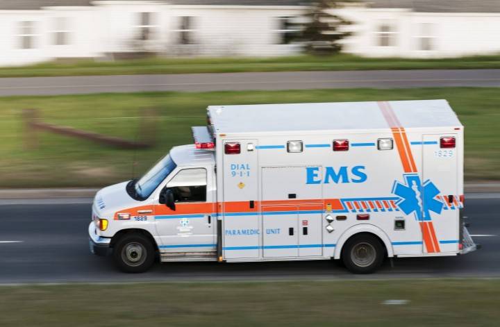 FILE: An ambulance travels along 14 Street N.W. in Calgary in response to an emergency call.