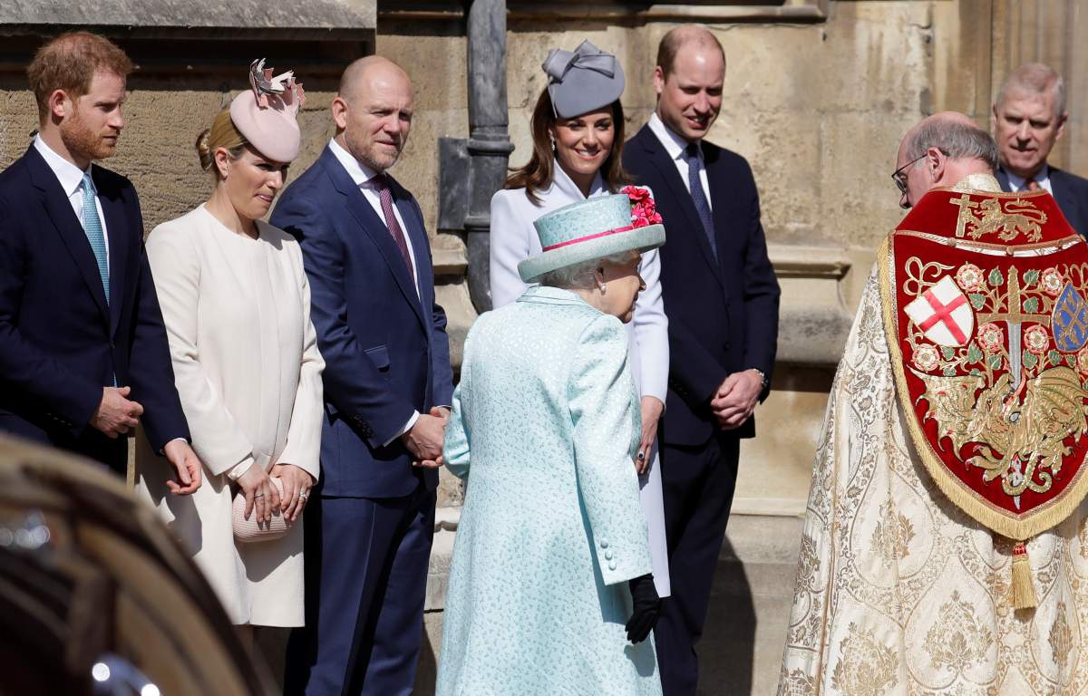 Queen Elizabeth is greeted by Catherine, Duchess of Cambridge, Prince William, and Prince Harry at St. George’s Chapel in Windsor, Britain on April 21, 2019.