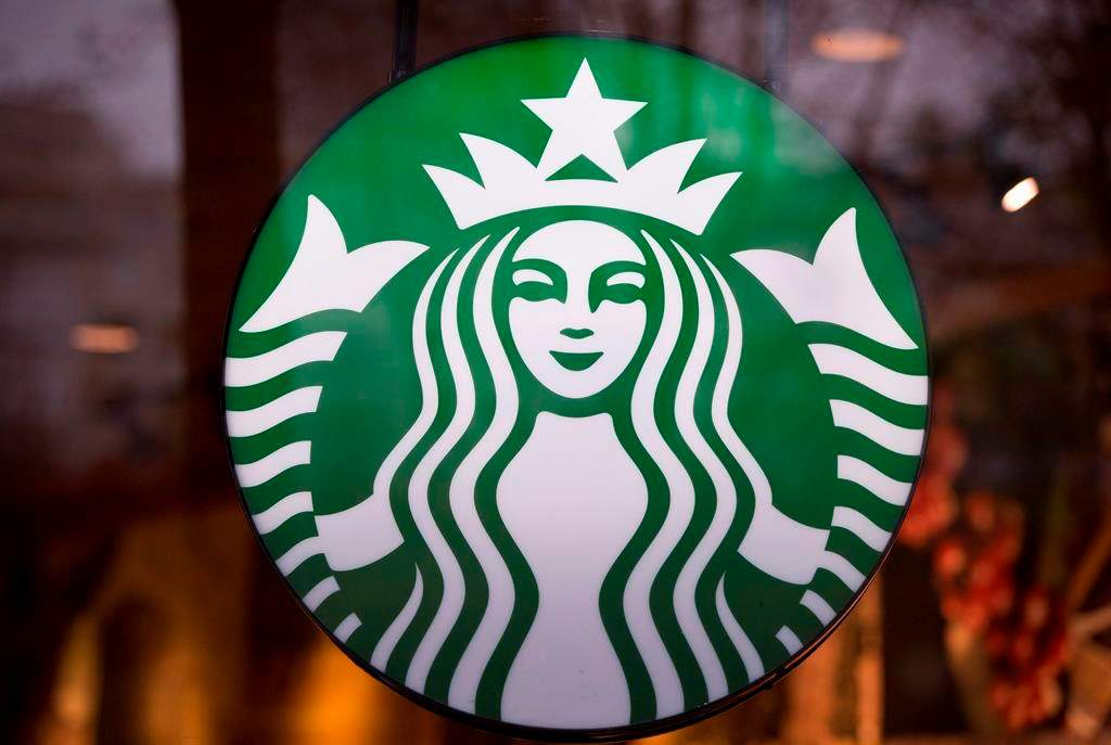 A Starbucks sign is pictured in downtown Vancouver on March 20, 2015.