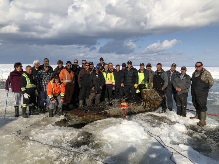 The first pontoon from the plane was recovered with help from local residents.
