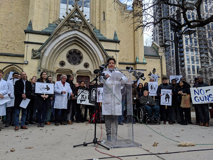 Dr. Najma Ahmed speaking to health-care professionals at a Toronto rally in favour of gun control on Wednesday.