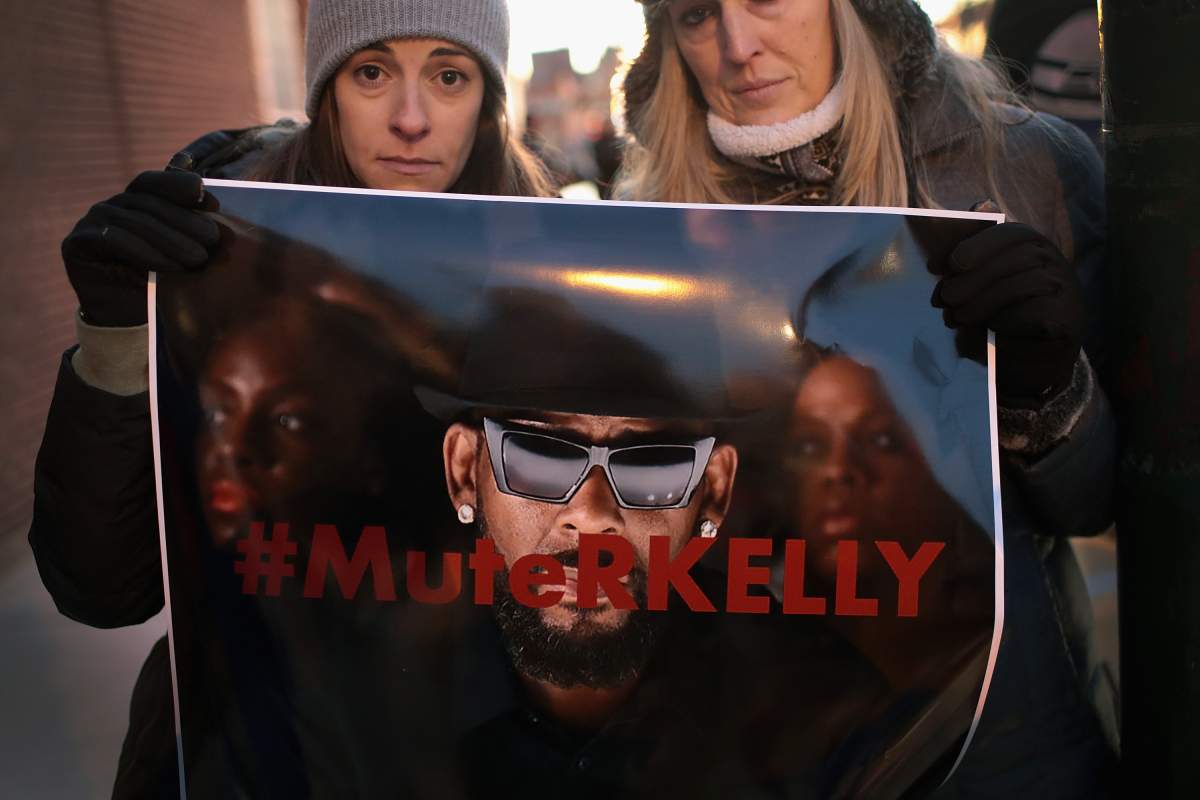 Demonstrators gather near the studio of singer R. Kelly to call for a boycott of his music after allegations of sexual abuse against young girls were raised on the highly rated Lifetime mini-series ‘Surviving R. Kelly’ on Jan. 9, 2019 in Chicago, Ill.