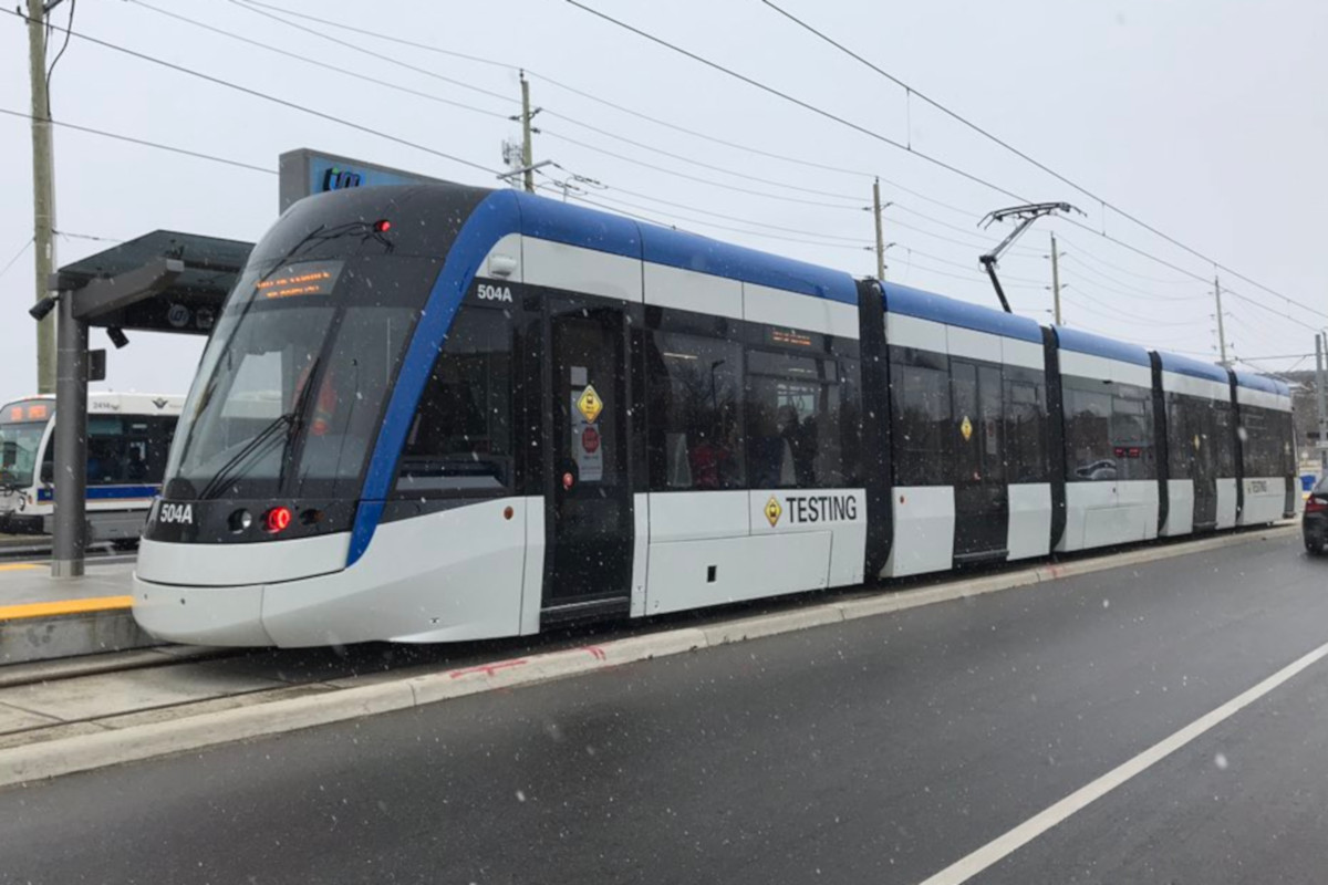 An ION train stops at Borden Station.
