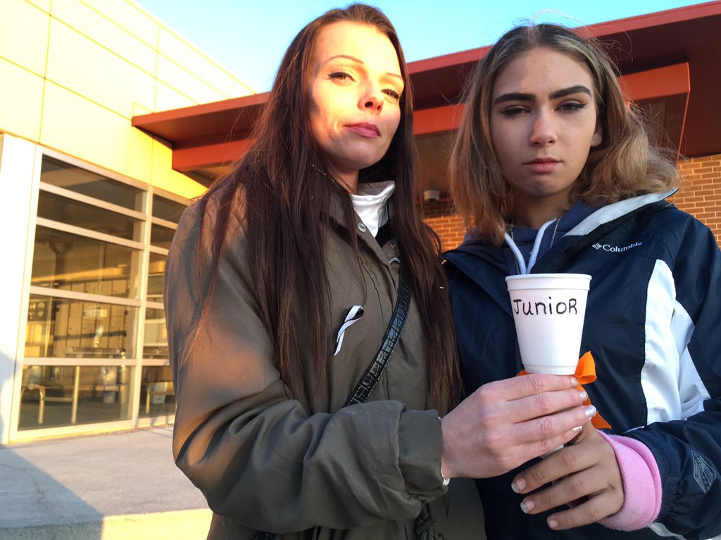 Jessica Robinson (left) and Samarah Loucks (right) stand together outside the Elgin-Middlesex Detention Centre during a vigil for Loucks’ dad, Sean William “Junior” Tourand-Brightman on April 28, 2019. Robinson, whose sister died at EMDC nearly 10 years ago, says she had to be at the vigil “to let [the family] know that they’re not alone in what they’re feeling.”