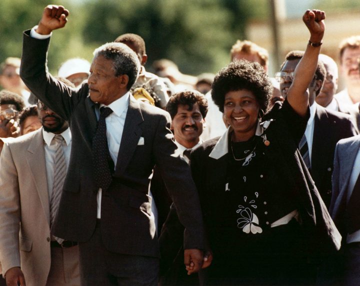 In this Sunday, Feb. 11, 1990, file photo, Nelson Mandela and wife Winnie, walk hand-in hand-with their raised clenched fists upon Mandela’s release from Victor Verster prison, near Cape Town, South Africa.
