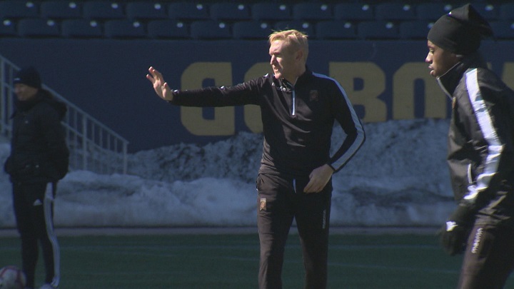 Valour FC general manager and head coach Rob Gale runs practice at Investors Group Field.