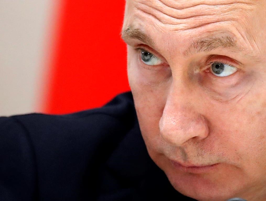 FILE - In this Feb. 14, 2019, file photo, Russian President Vladimir Putin listens during a meeting in the Bocharov Ruchei residence in the Black Sea resort of Sochi, Russia.