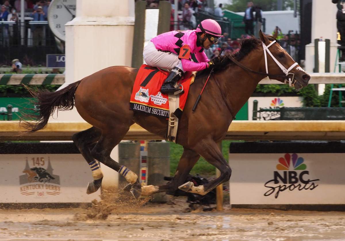Luis Saez aboard Maximum Security (7) crosses the finish line during the 145th running of the Kentucky Derby at Churchill Downs.