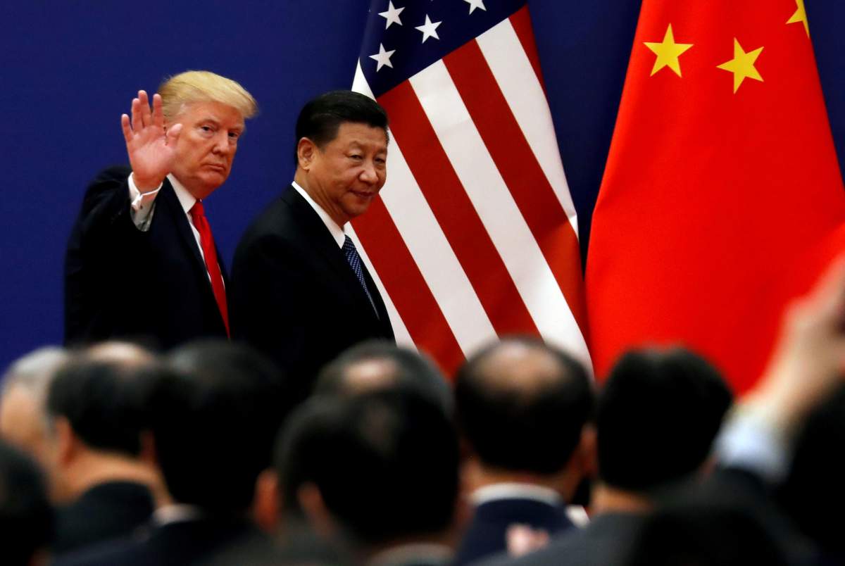 U.S. President Donald Trump and China's President Xi Jinping meet business leaders at the Great Hall of the People in Beijing, China, Nov. 9, 2017.