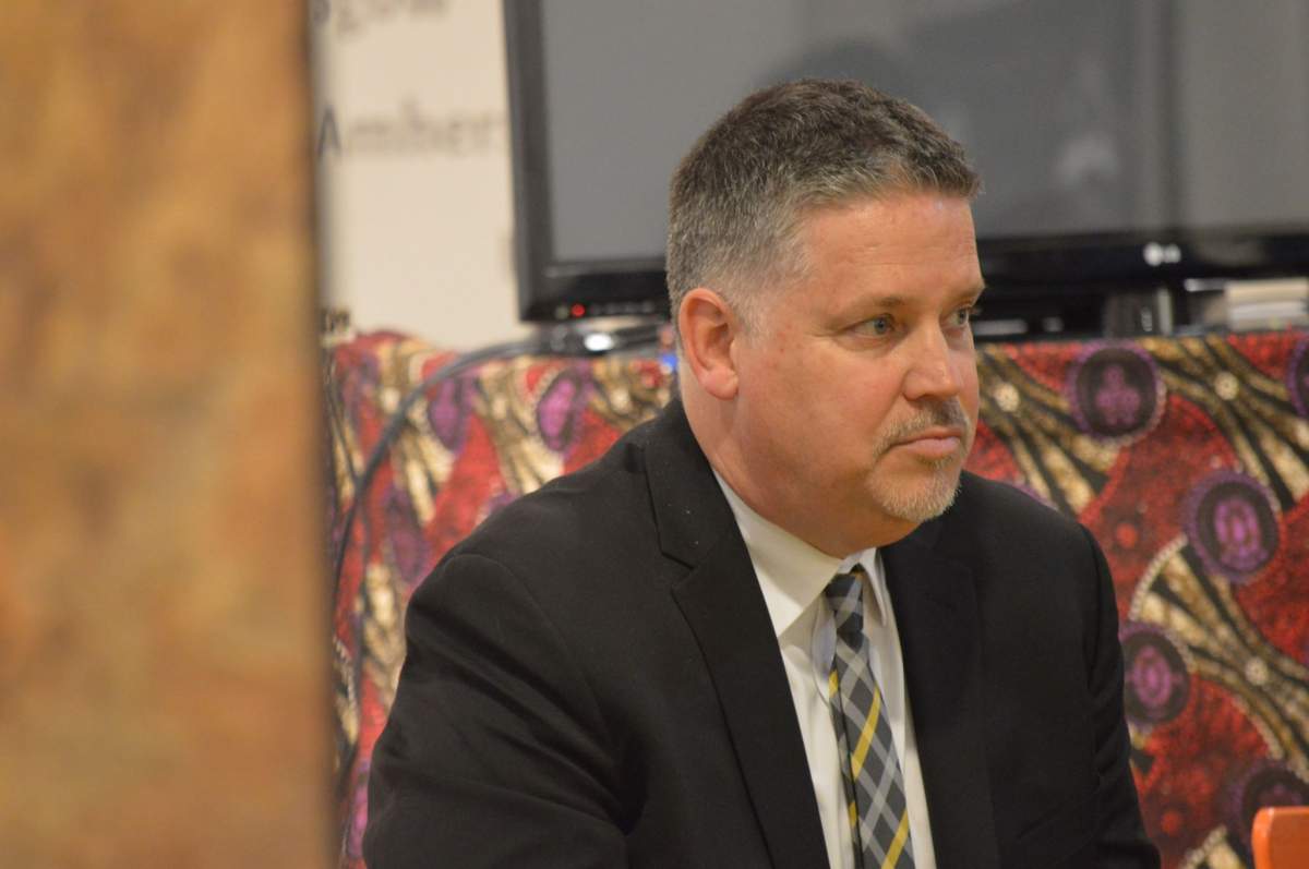 Scot Wortley listens to a question at a community meeting on street checks on May 21, 2019. 