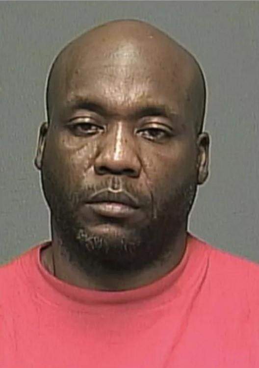 Perez Cleveland is seen in this undated police handout photo. A Crown prosecutor says a man on trial for first-degree murder maintained control over multiple women he lived with through surveillance, drugs and abuse. Perez Cleveland, 46, has pleaded not guilty in the death of Jennifer Barrett, 42, whose body was found in a barrel behind their Winnipeg home in December 2016.
