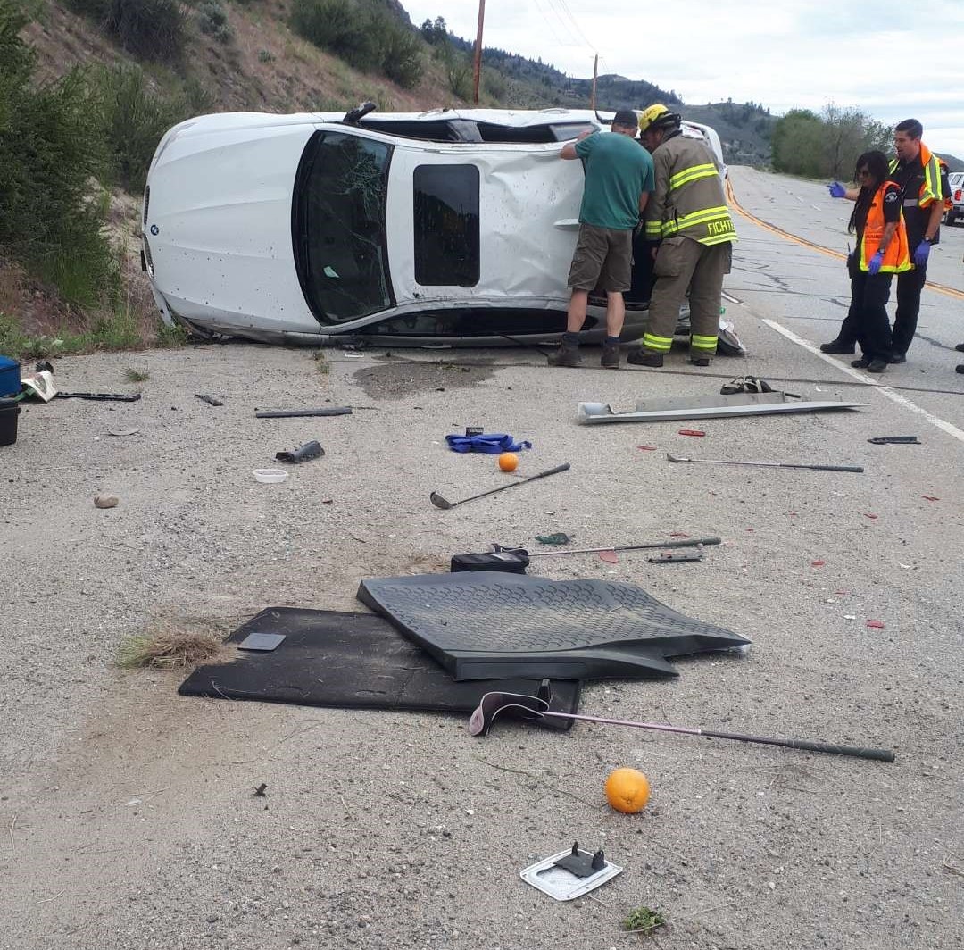 Emergency crews inspect the rollover prior to cutting open the roof. The accident happened just before 2 p.m. on Monday.
