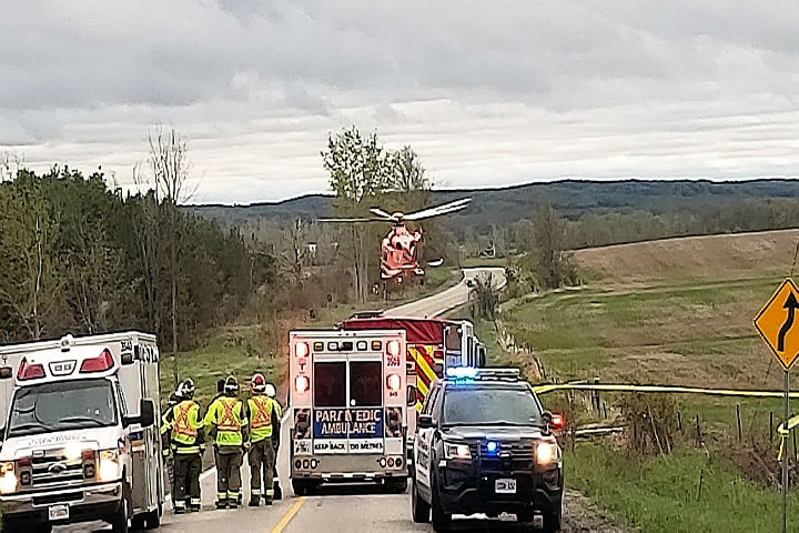 Charges have been laid after a vehicle rollover in Innisfil left a man with critical injuries during the Victoria Day long weekend.