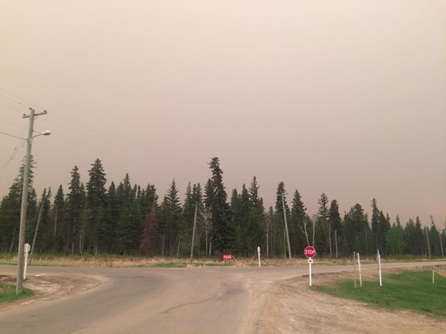 A orange haze in the sky over Wabasca, Alta., on Sunday, May 26, 2019, which is south of the Trout Lake wildfire that began over the weekend. 
