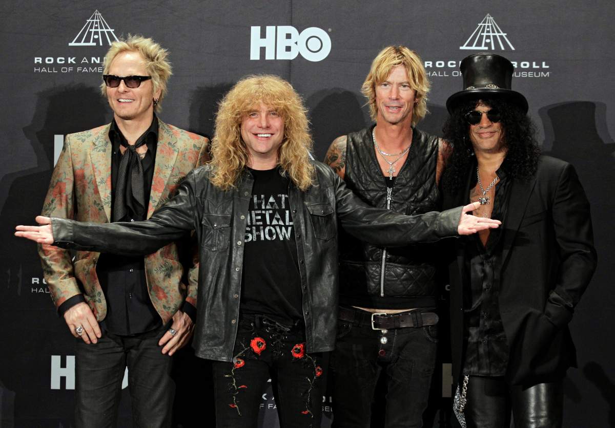 Guns N’ Roses, from left: Matt Sorum, Steven Adler, Duff McKagan and Slash appear in the press room after induction into the Rock & Roll Hall of Fame, on April 14, 2012, in Cleveland, Ohio.