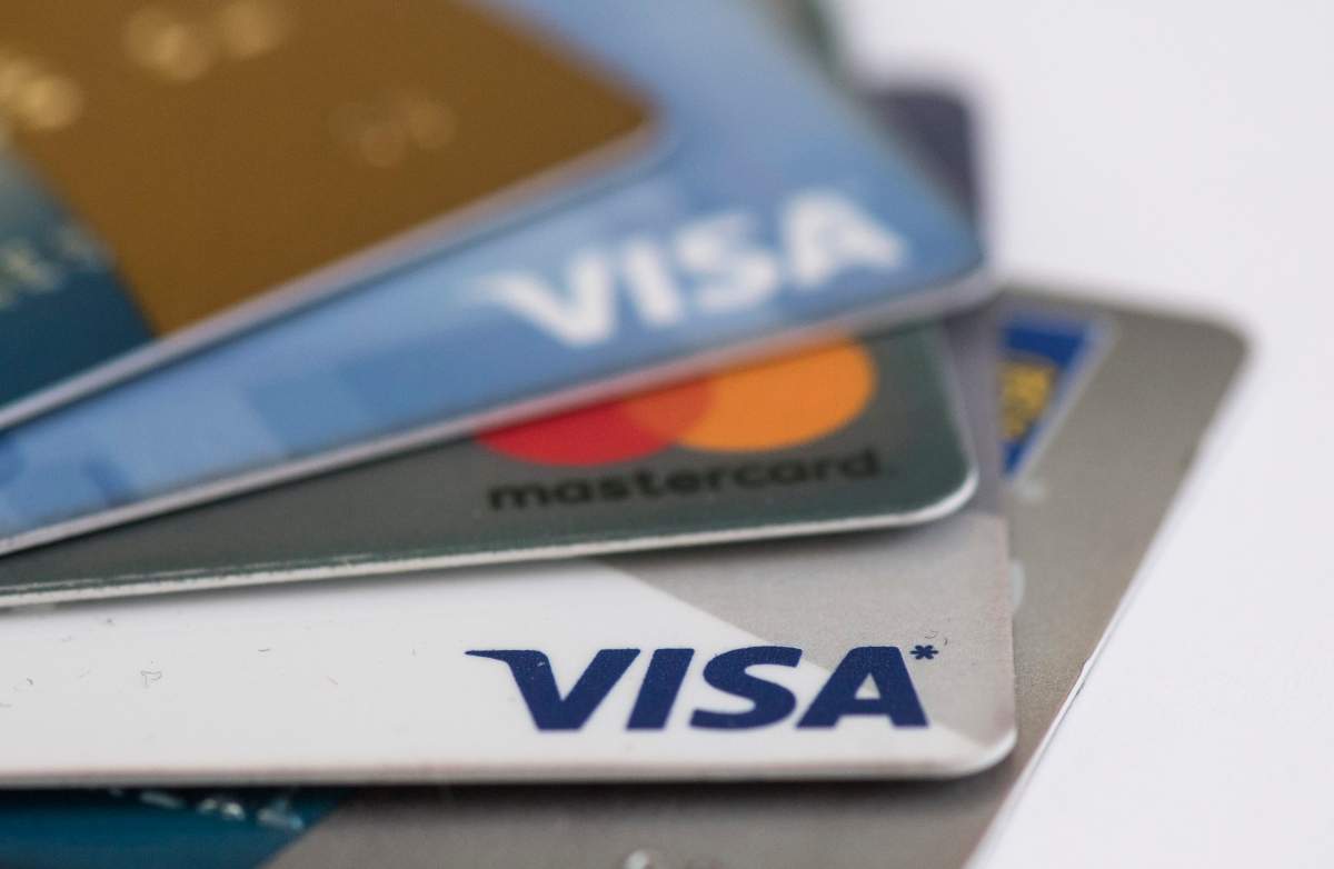 Visa and Mastercard credit cards are shown in Montreal, Thursday, February 14, 2019. 