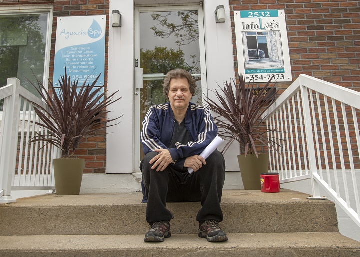 Richard Martin, who lives in a subsidized housing complex, sits in front of the social housing offices Wednesday, May 29, 2019 in Montreal. Montreal is about to introduce a new housing policy which will force condo developers to build more social and affordable housing for people like Martin.