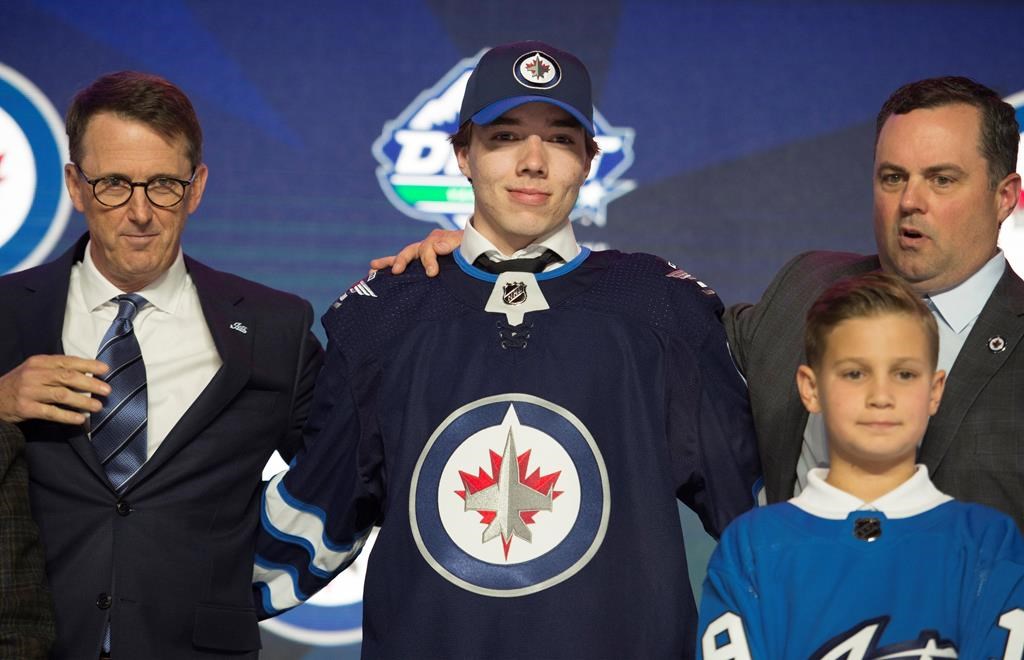 Winnipeg Jets select Ville Heinola during the first-round NHL draft at Rogers Arena in Vancouver, Friday, June 21, 2019. THE CANADIAN PRESS/Jonathan Hayward