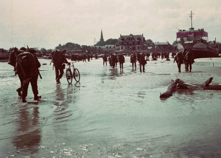 Canadian soldiers land on a Normandy, France beach during the D-Day invasion on June 6, 1944.