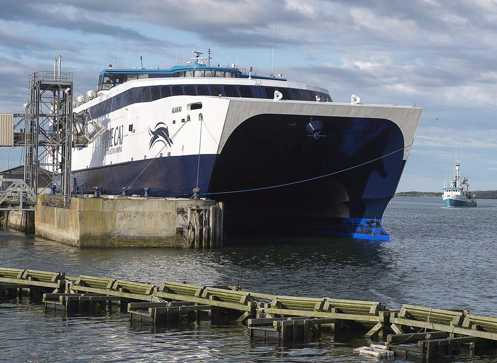 The CAT, a high-speed passenger ferry, prepares to depart Yarmouth, N.S. heading to Portland, Maine on its first scheduled trip on Wednesday, June 15, 2016. The heavily subsidized ferry between Nova Scotia and Maine says it won't be able to start on schedule at the end of this month because of delays related to renovating its new terminal in Bar Harbor.