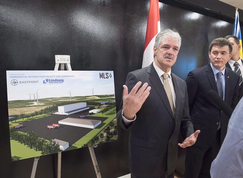 Stephen Matier, left, president of Maritime Launch Services talks with reporters at a meeting of the proposed Spaceport project team in Dartmouth, N.S. on Monday, Dec. 11, 2017.