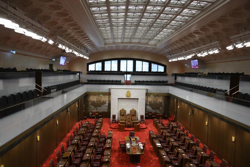 The Senate of Canada building and Senate Chamber are pictured in Ottawa on Monday, Feb. 18, 2019. A bill that aims to end solitary confinement has passed in the Senate with a number of amendments, changes a group of more than 100 lawyers and law societies say are necessary to ensure the bill stays on the right side of the law.