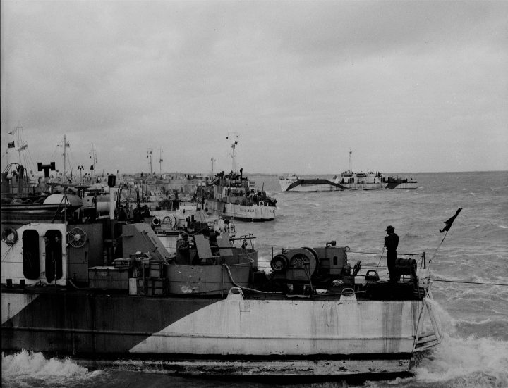 Allied warships are shown at Bernieres-sur-Mer, France on June 6, 1944.