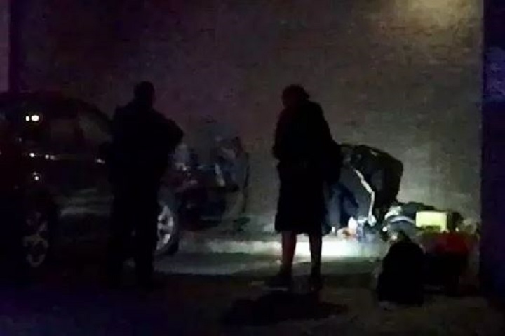 Kelowna RCMP, seen here attending the stabbing victim, say a suspect has been identified in Thursday night’s incident.