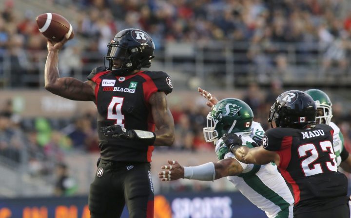 Ottawa Redblacks quarterback Dominique Davis (4) throws the ball during first quarter CFL action against the Saskatchewan Roughriders in Ottawa on Thursday, June 20, 2019. 