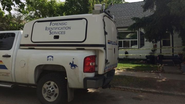 Members of the RCMP forensic unit search a home in North Battleford, Sask., on June 8, 2019, as part of the investigation into the disappearance of Tiki Brook-Lyn Laverdiere, which is now being called a homicide by police.