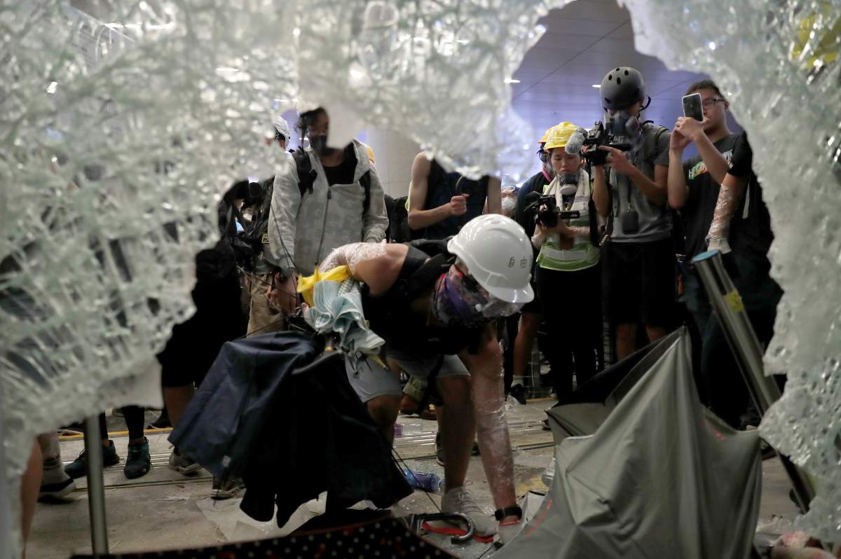 Hong Kong police use tear gas after protesters storm government headquarters - image