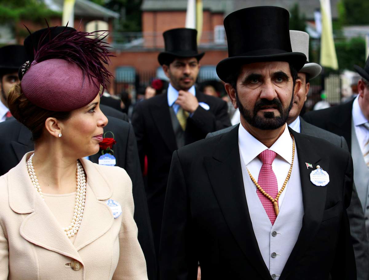 FILE PHOTO: Jordanian Princess Haya bint Al-Hussein and husband, Dubai ruler Sheikh Mohammed bin Rashid al-Maktoum, arrive for Ladies Day, the third day of racing at Royal Ascot in southern England June 16, 2011.