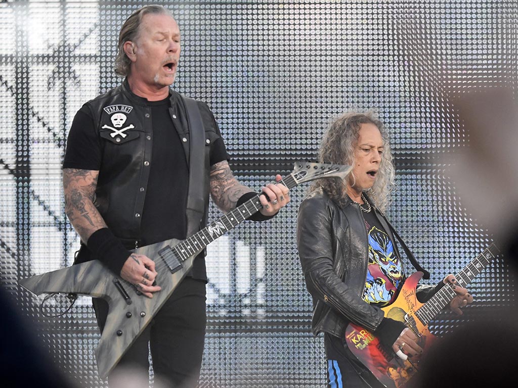 James Hetfield (L) and Kirk Hammett of Metallica perform onstage during the band’s WorldWired tour concert in Hämeenlinna, Finland, on July 16, 2019.