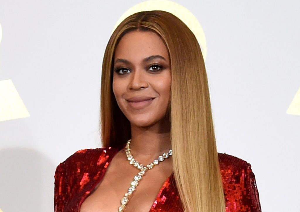 In this Feb. 12, 2017 file photo, Beyonce poses in the press room at the 59th annual Grammy Awards in Los Angeles. (Photo by Chris Pizzello/Invision/AP, File)