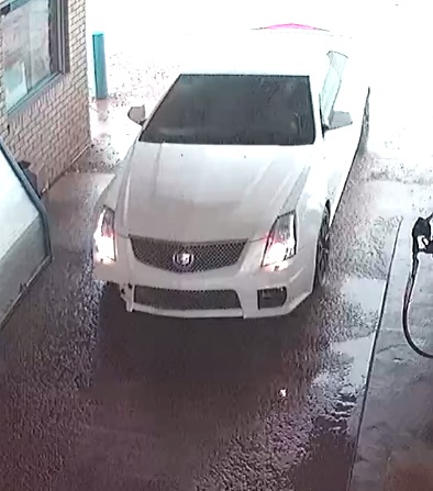 2011 White Cadillac CTS with front passenger bumper damage